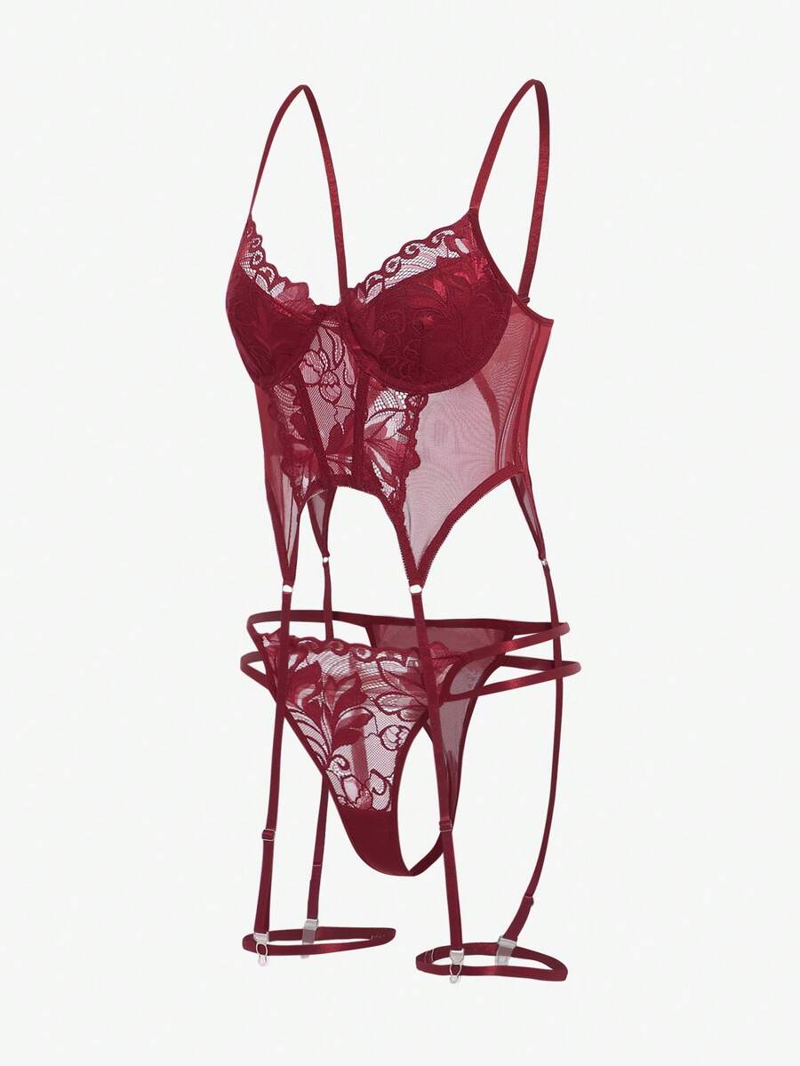 Women's black floral lace corset lingerie set featuring cut out details, underwire demi bra, adjustable straps, and matching thong.