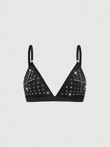 Front view of black gothic cross studded triangle bralette with adjustable spaghetti straps.