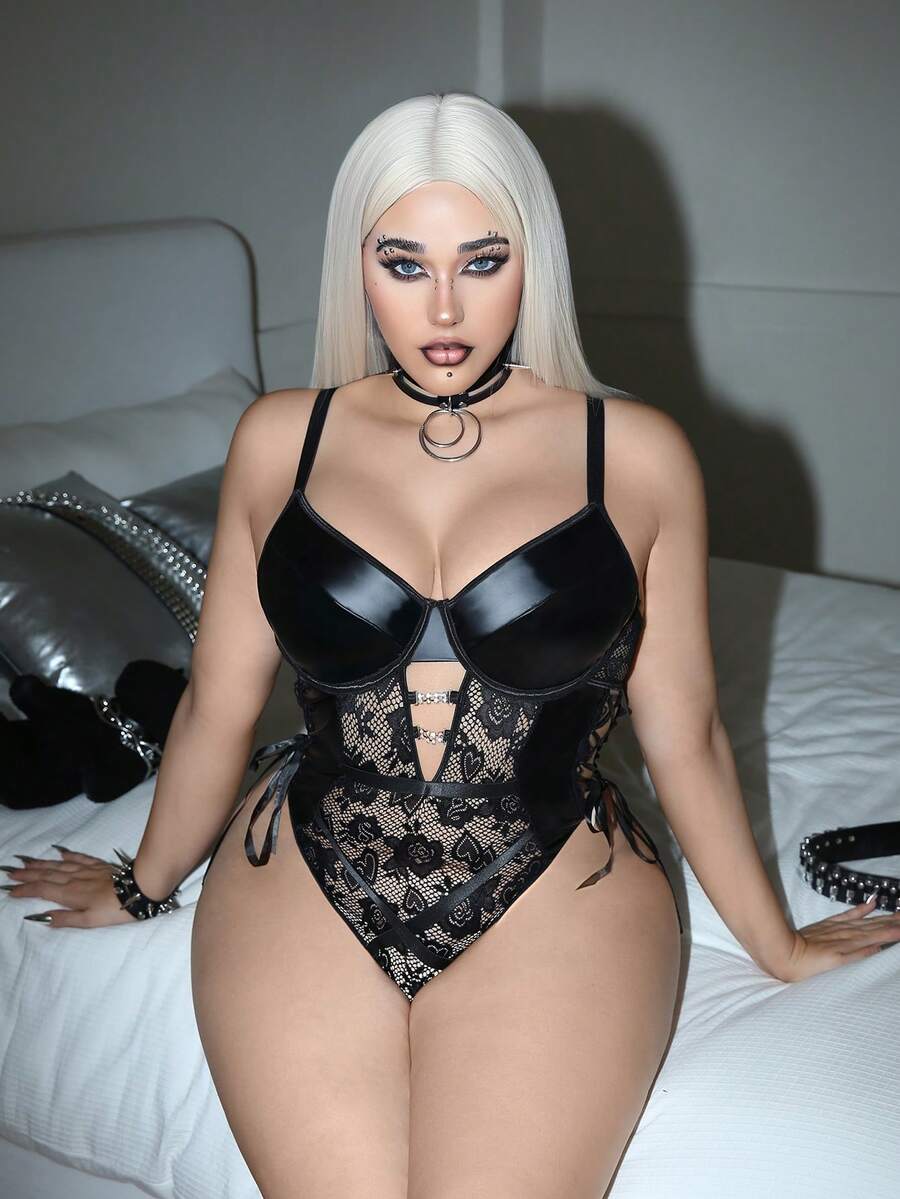 Plus size women black lace sheer bodysuit featuring backless design, bow detail, underwire support, and adjustable spaghetti straps.