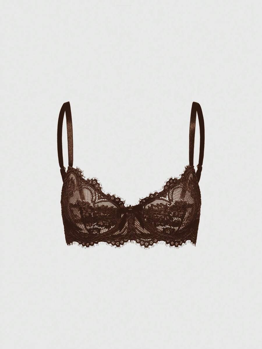 Black sheer floral lace plunge bra featuring underwire support, unlined triangle cups, adjustable straps, and a backless design for women.