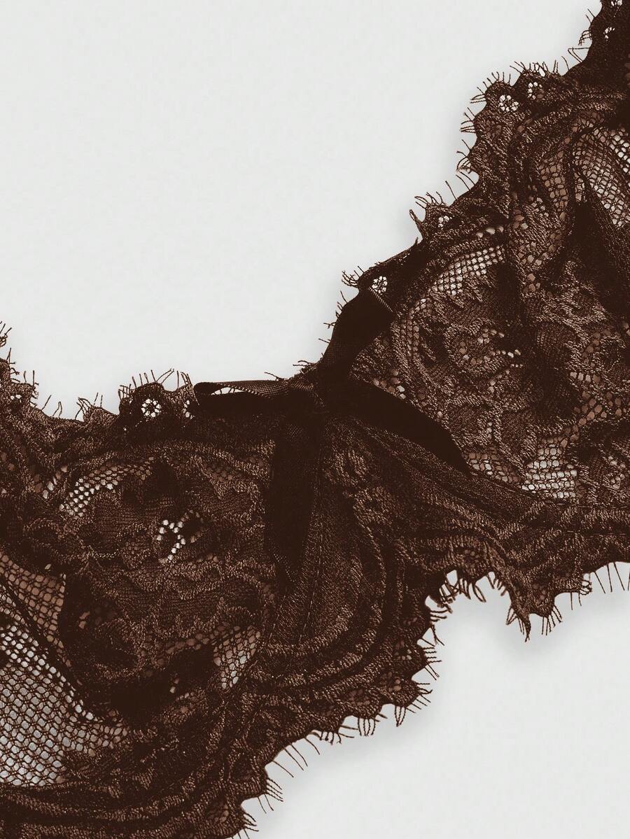 Black sheer floral lace plunge bra featuring underwire support, unlined triangle cups, adjustable straps, and a backless design for women.
