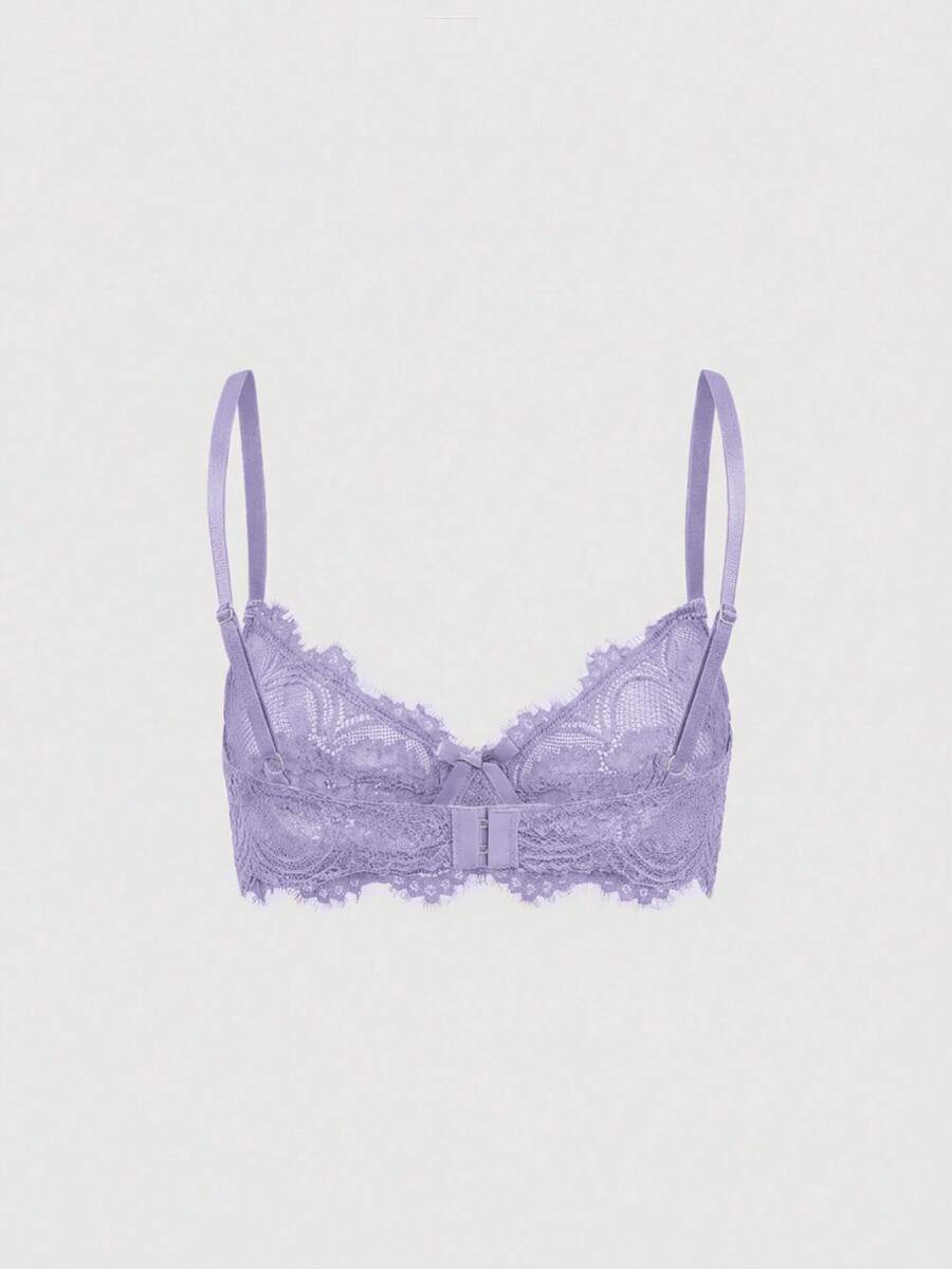 Black sheer floral lace plunge bra featuring underwire support, unlined triangle cups, adjustable straps, and a backless design for women.