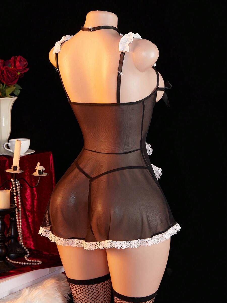 Women's 4-piece black lingerie set featuring a sheer lace nightgown with backless design, adjustable spaghetti straps, fishnet stockings, and matching choker.