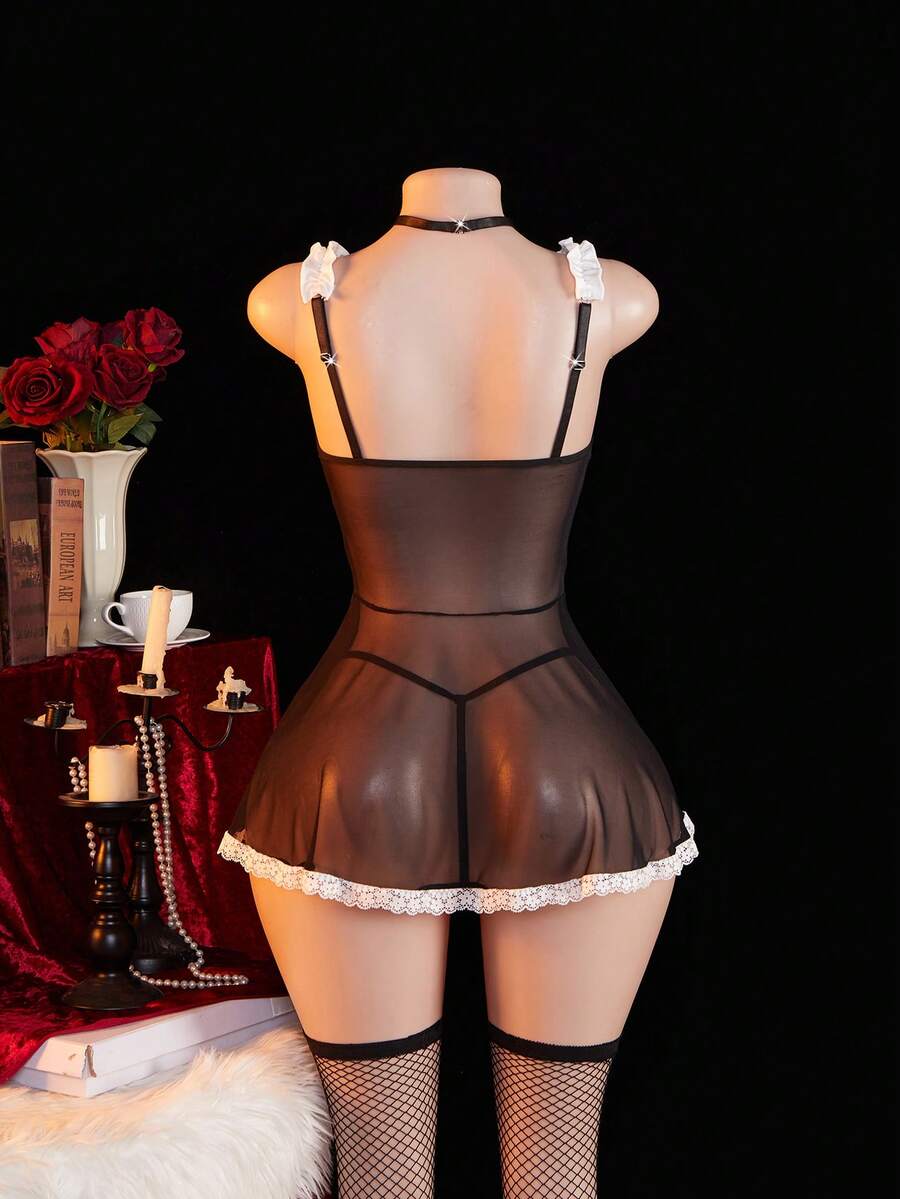 Women's 4-piece black lingerie set featuring a sheer lace nightgown with backless design, adjustable spaghetti straps, fishnet stockings, and matching choker.