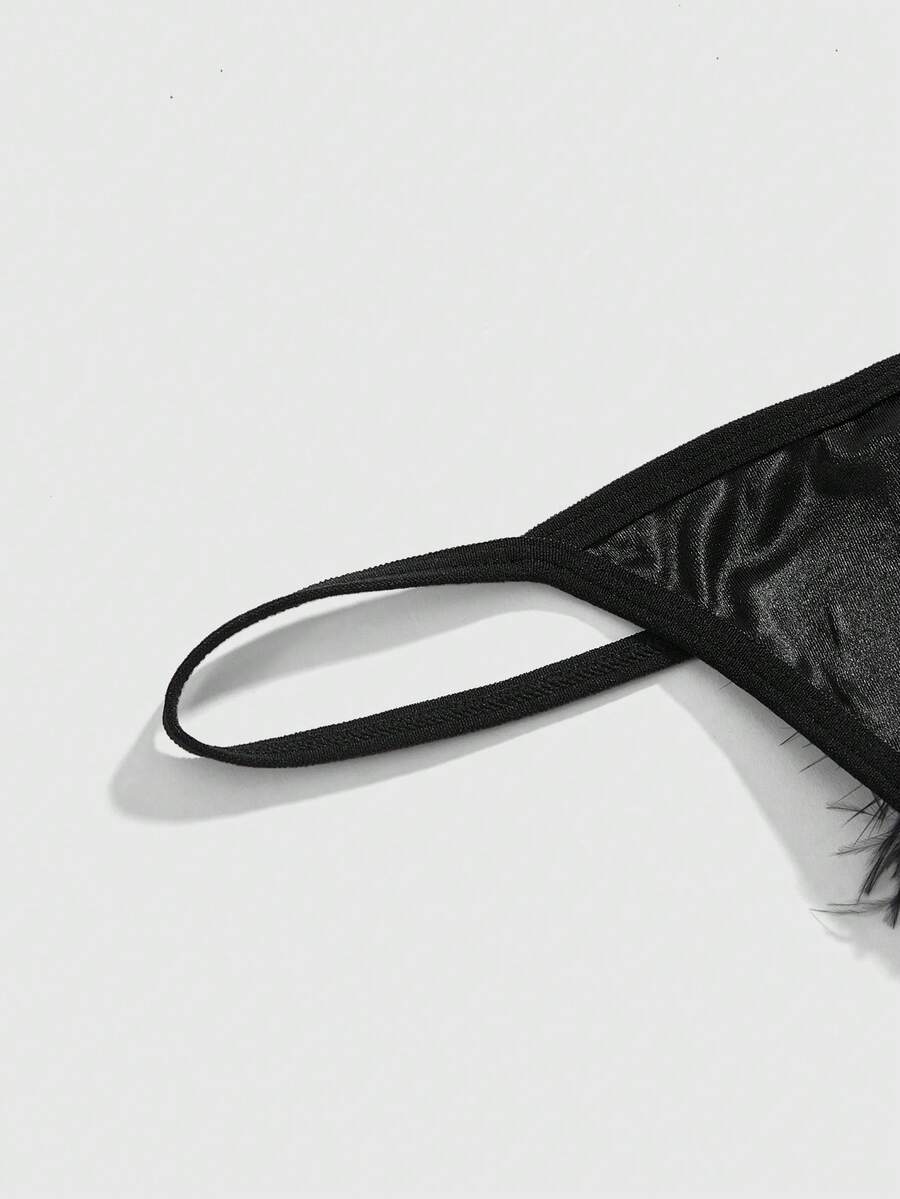 Black gothic furry tail thong panties for women featuring a low rise fit in knitted fabric.