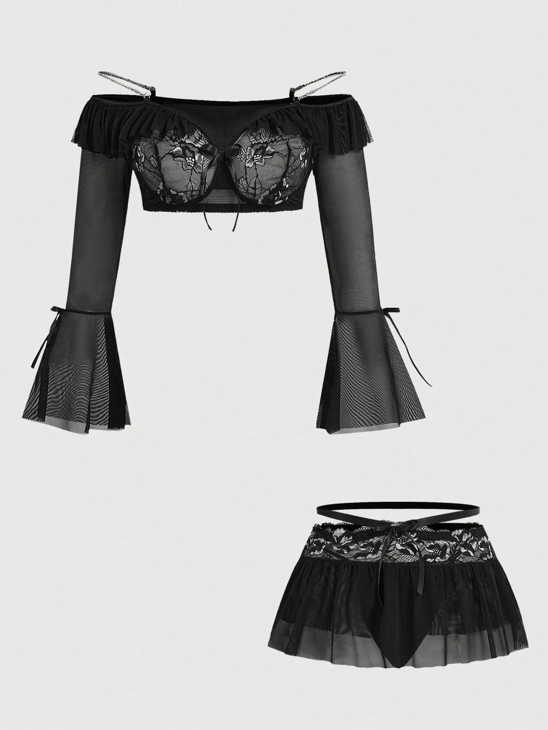 Black plus size gothic lingerie set featuring an off-shoulder bra with metal chain straps, underwire support, low rise thong, and ruffle hem mini skirt.