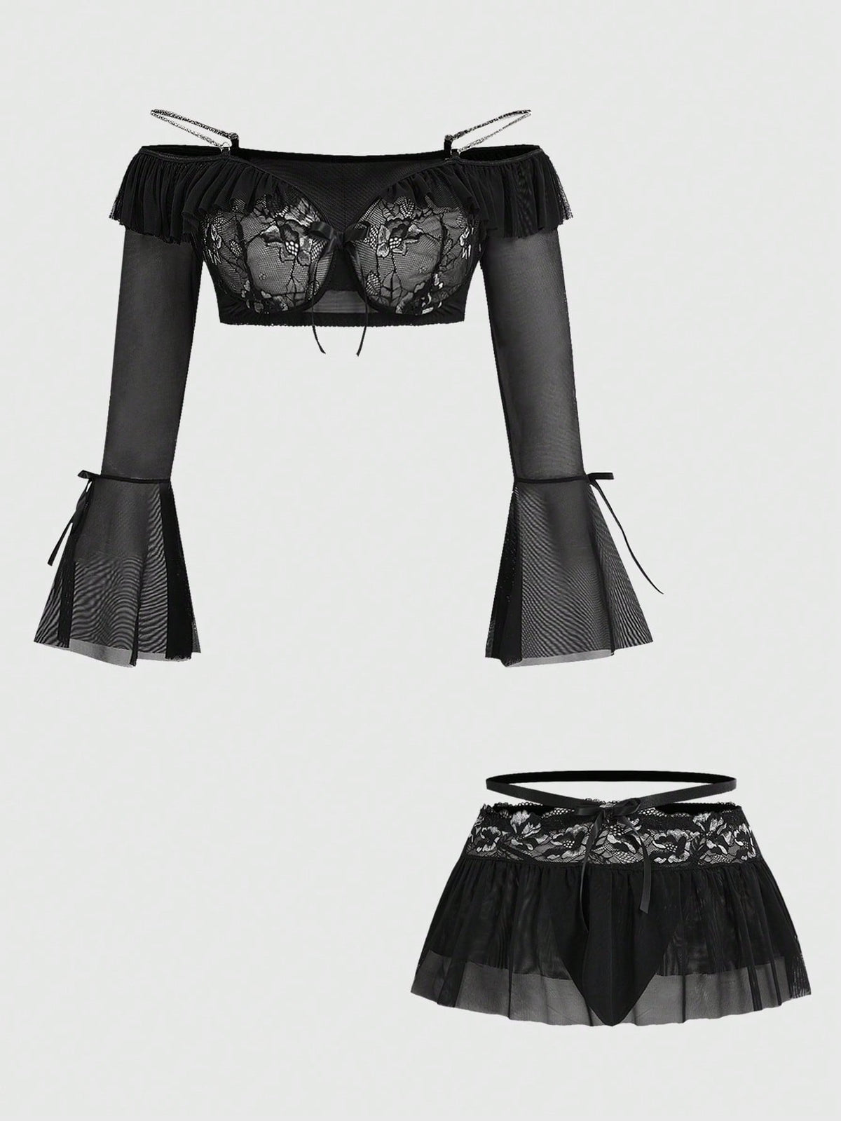 Black plus size gothic lingerie set featuring an off-shoulder bra with metal chain straps, underwire support, low rise thong, and ruffle hem mini skirt.