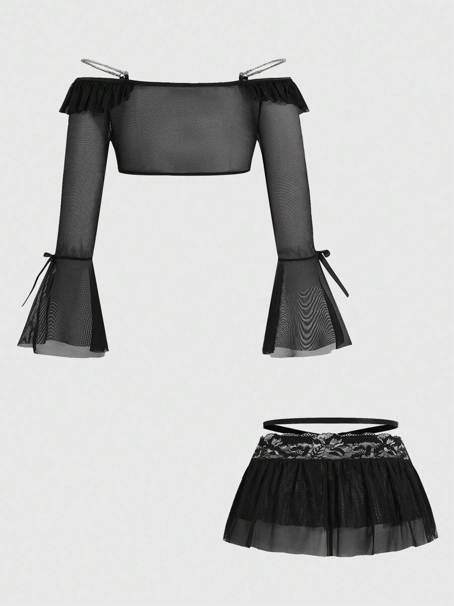 Black plus size gothic lingerie set featuring an off-shoulder bra with metal chain straps, underwire support, low rise thong, and ruffle hem mini skirt.