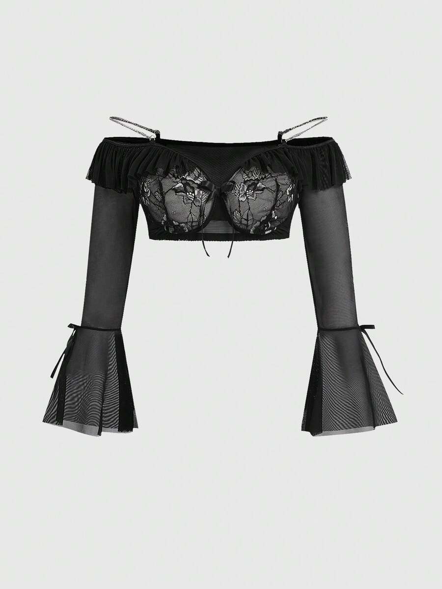 Black plus size gothic lingerie set featuring an off-shoulder bra with metal chain straps, underwire support, low rise thong, and ruffle hem mini skirt.