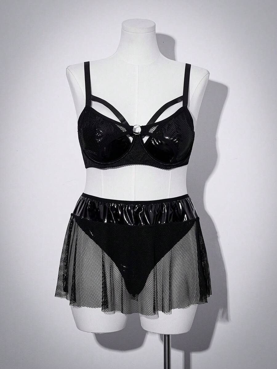 Black plus size lingerie dress featuring backless cup detail with underwire, adjustable spaghetti straps, and mid rise briefs.