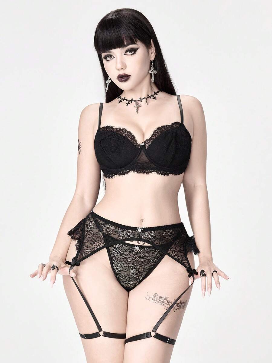 Black Goth Y2K lingerie set featuring a wireless backless knot crop bralette top with adjustable straps and matching low-rise briefs.
