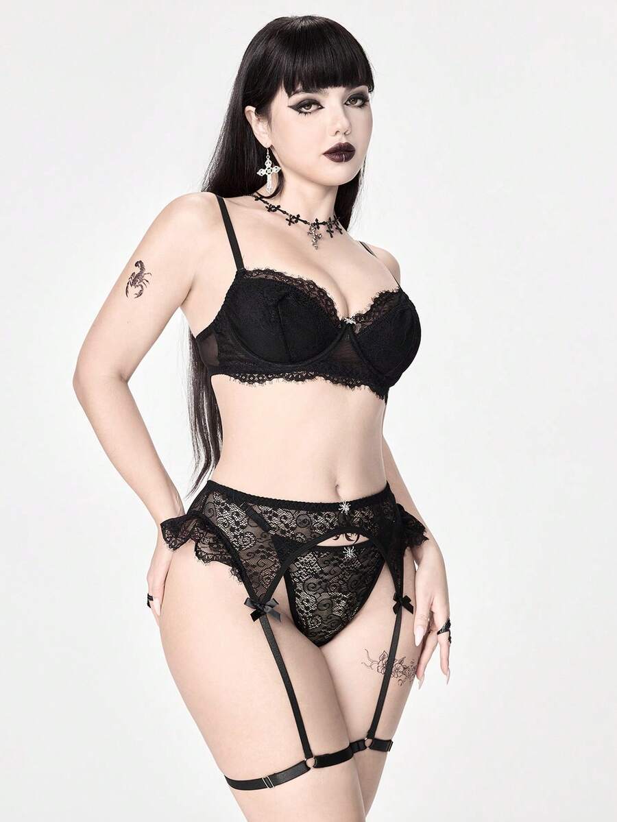 Black Goth Y2K lingerie set featuring a wireless backless knot crop bralette top with adjustable straps and matching low-rise briefs.