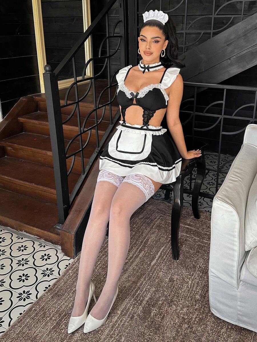 Sleeveless black and white lace patchwork dress for women with ruffle trim, bow detail, underwire support, and adjustable spaghetti straps.