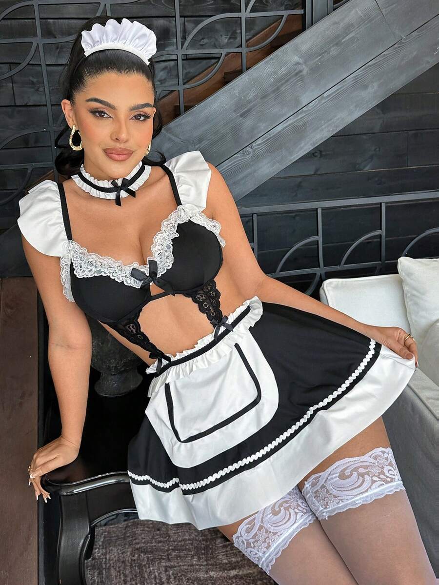 Sleeveless black and white lace patchwork dress for women with ruffle trim, bow detail, underwire support, and adjustable spaghetti straps.