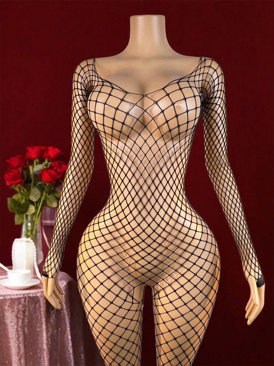 Women's black open crotch fishnet bodystocking featuring cut out details