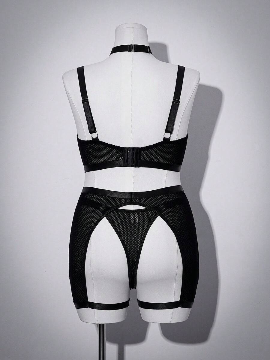 Black plus size goth babydoll lingerie set featuring sheer fabric, underwire support, adjustable spaghetti straps, and high rise briefs.