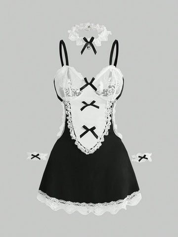 Women's 3-piece black gothic lingerie costume set featuring a contrast lace slip dress with bow decor, ruffle hem, underwire cups, and adjustable spaghetti straps.