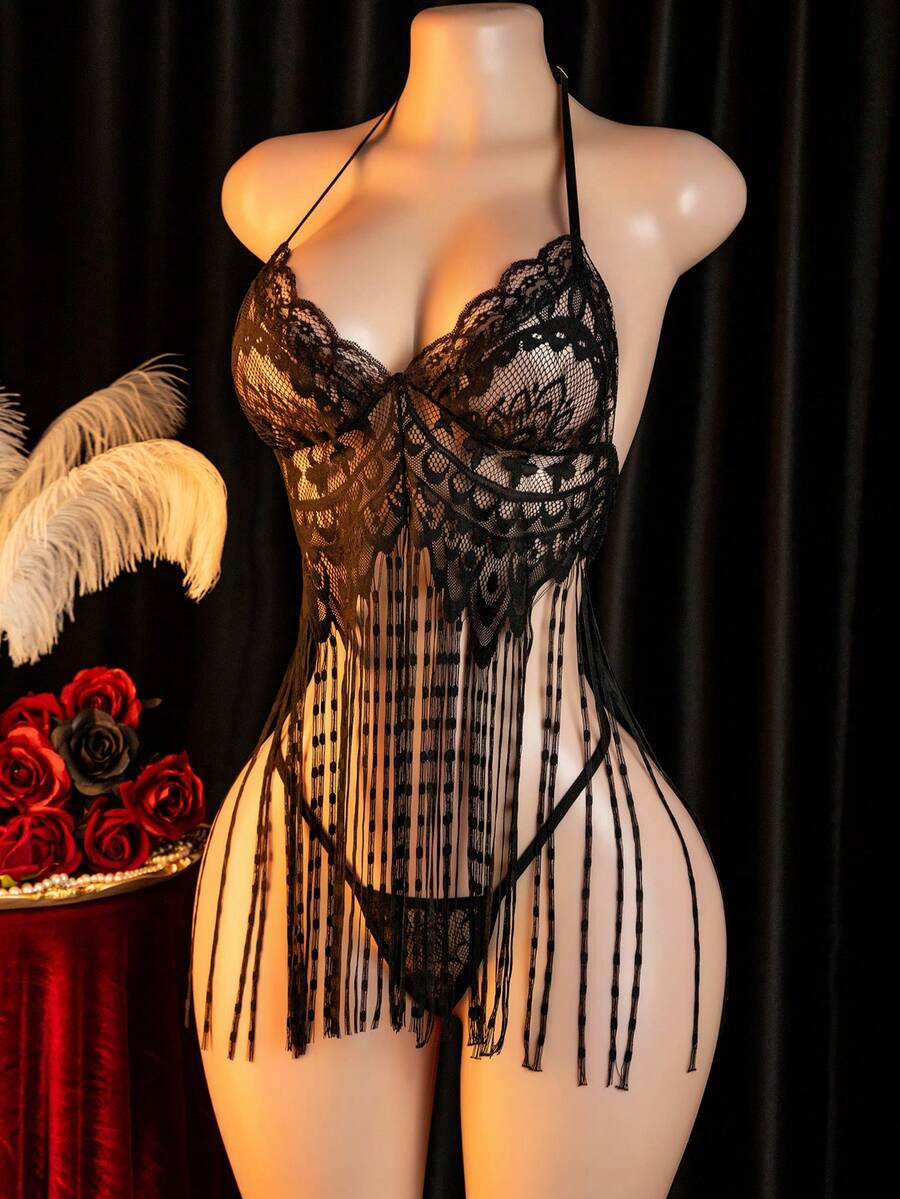 Women's black sheer halter slip dress and matching low-rise V-string 2-piece lingerie set.