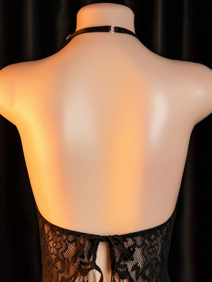 Women's black sheer halter slip dress and matching low-rise V-string 2-piece lingerie set.