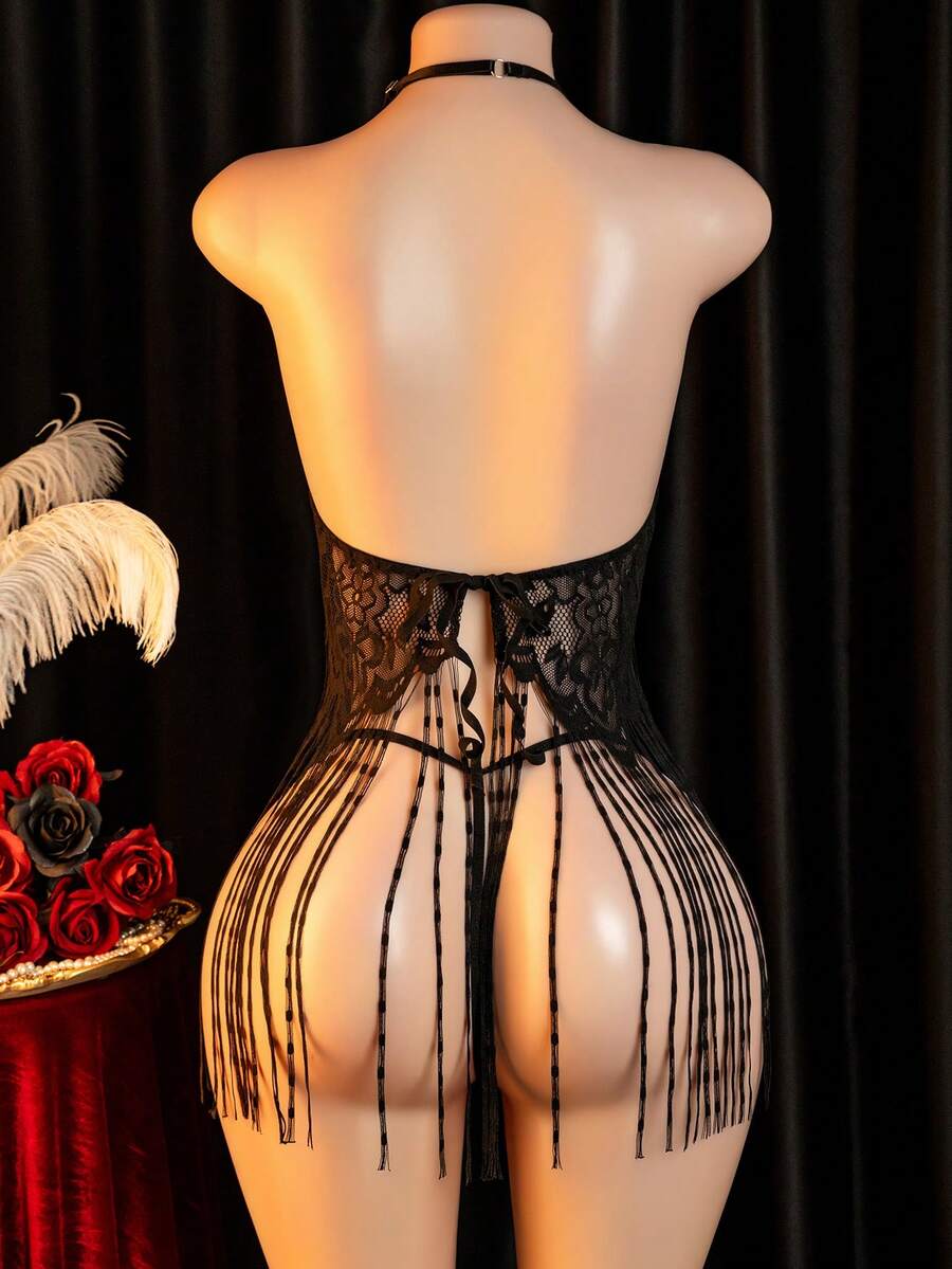 Women's black sheer halter slip dress and matching low-rise V-string 2-piece lingerie set.