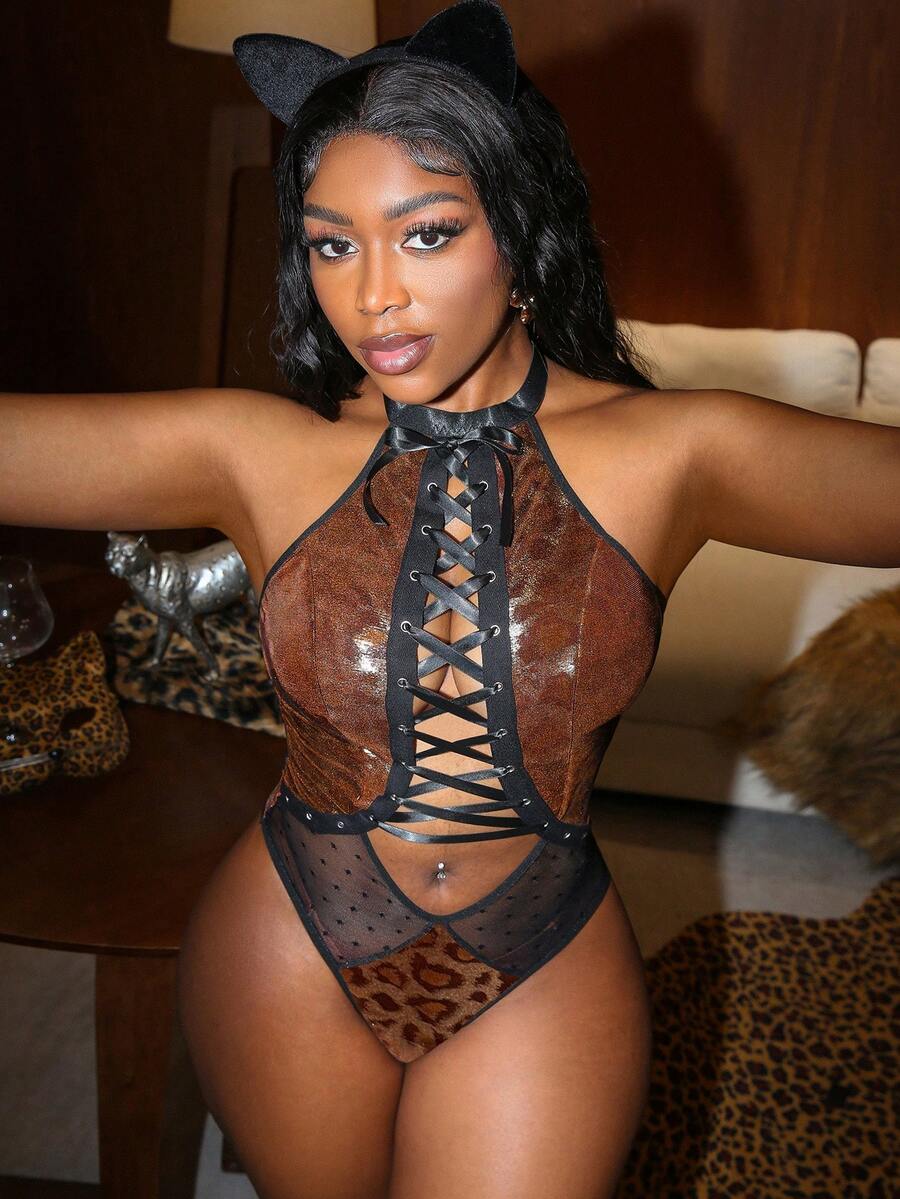 Multicolor 2-piece animal costume set for women featuring halter neckline, criss-cross strap details, contrast lace, and slim fit mini silhouette.