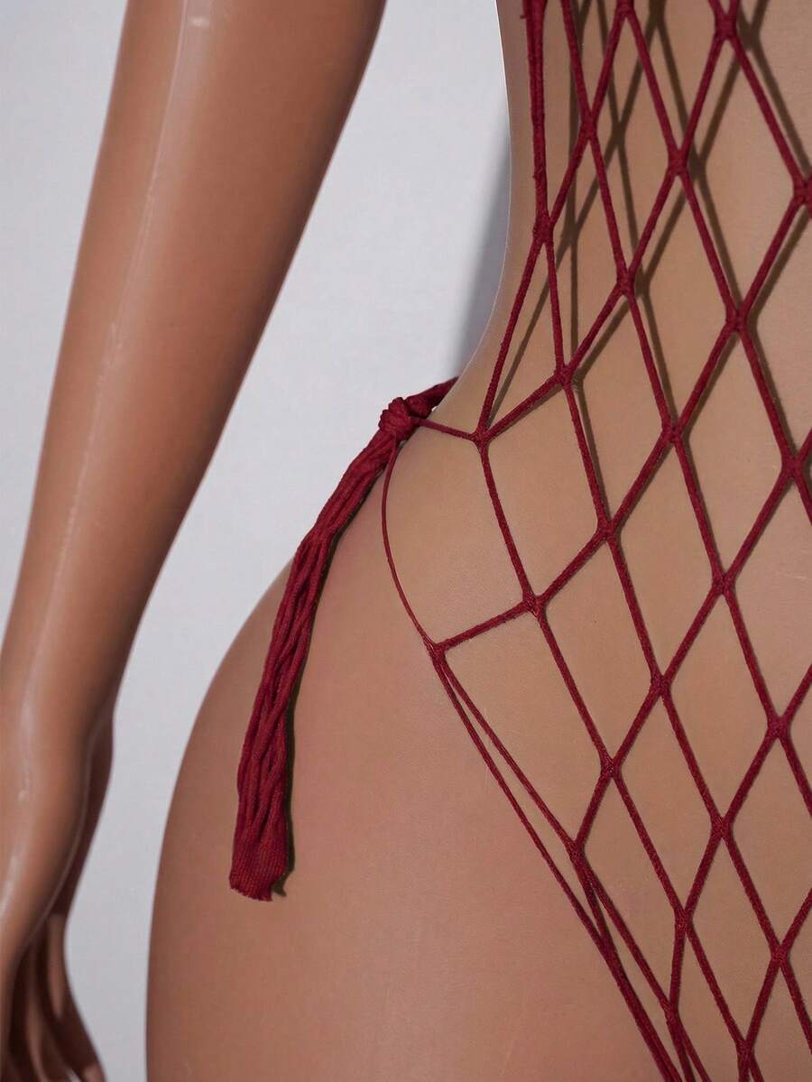 Black halter lace-up teddy lingerie featuring Y2K hollow-out details, adjustable straps, and a sheer finish.