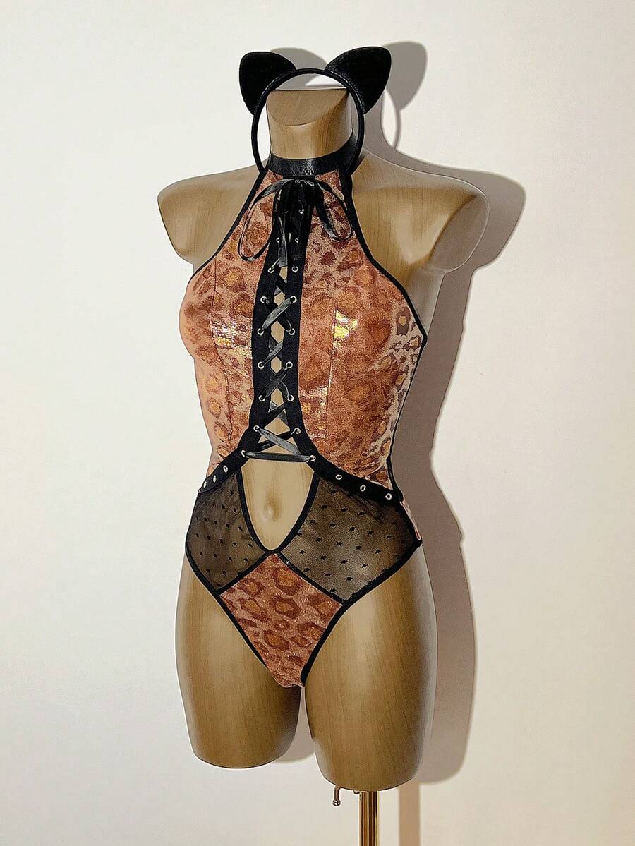 Multicolor 2-piece animal costume set for women featuring halter neckline, criss-cross strap details, contrast lace, and slim fit mini silhouette.