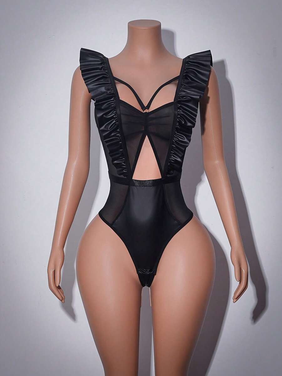 Women's black sheer teddy lingerie with ruffle trim and adjustable spaghetti straps.