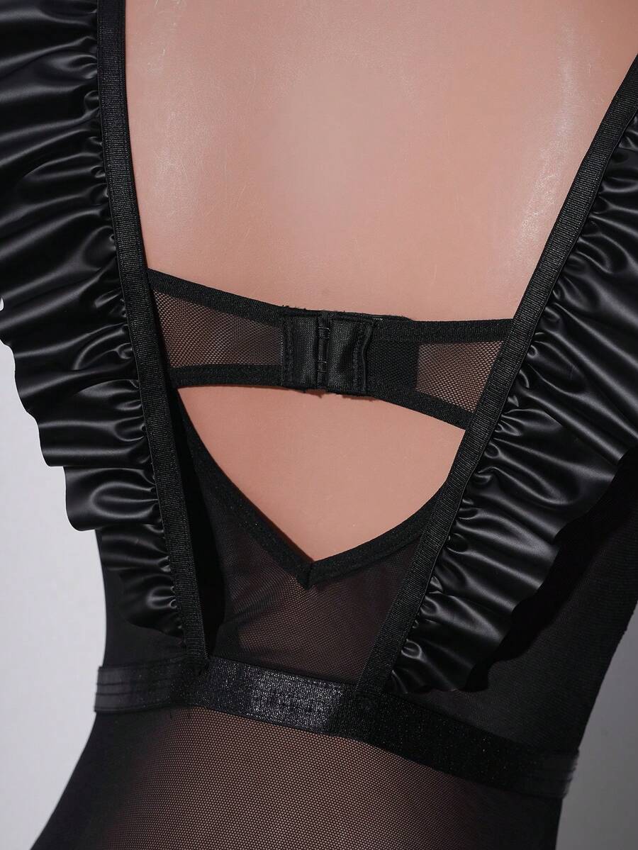 Women's black sheer teddy lingerie with ruffle trim and adjustable spaghetti straps.