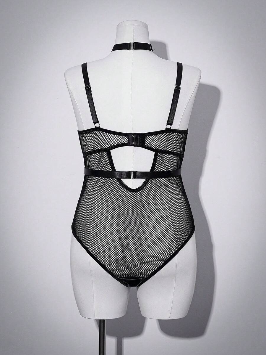 Black plus size mesh patchwork lingerie bodysuit featuring backless ring detail, sheer panels, underwire support, and adjustable spaghetti straps.