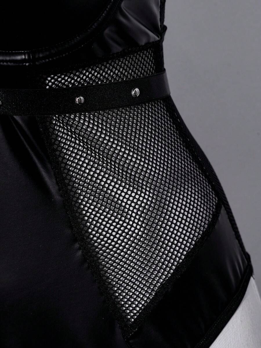 Black plus size mesh patchwork lingerie bodysuit featuring backless ring detail, sheer panels, underwire support, and adjustable spaghetti straps.