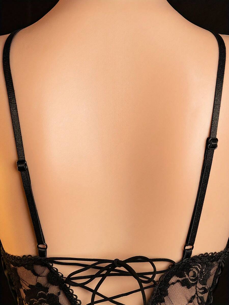 Black sleeveless wireless lingerie jumpsuit for women featuring a deep V-neck with hollow out front detail and thin spaghetti straps.