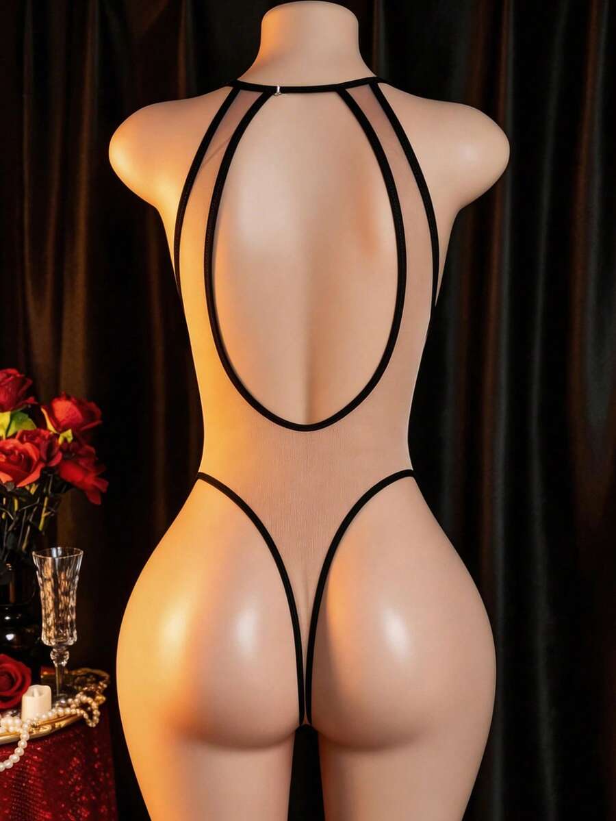 Women's sheer floral mesh teddy camisole featuring cut-out backless design, round neck, adjustable straps, and thong panty in burgundy.