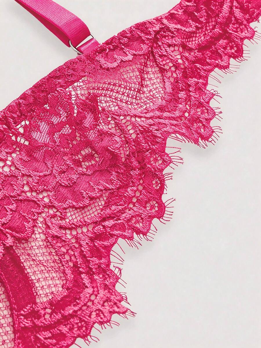 Black sheer floral lace plunge bra featuring underwire support, unlined triangle cups, adjustable straps, and a backless design for women.