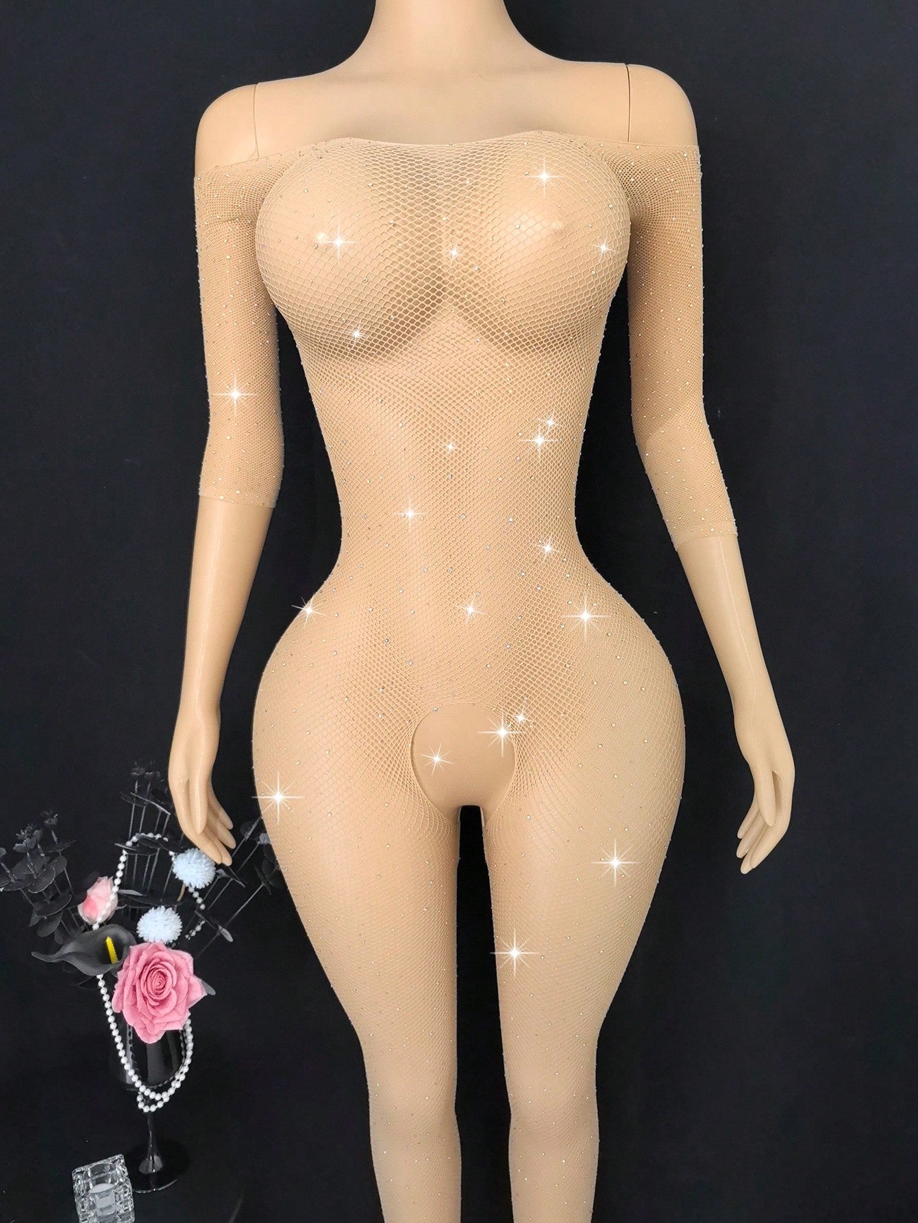 Women's apricot mesh lingerie jumpsuit with long sleeves, adjustable spaghetti straps, semi-sheer finish, and high-stretch fit.