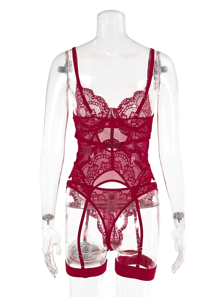 3-piece black lace lingerie set featuring a longline underwire 1/2 cup bra with adjustable spaghetti straps, cut out details, and matching low-rise thong