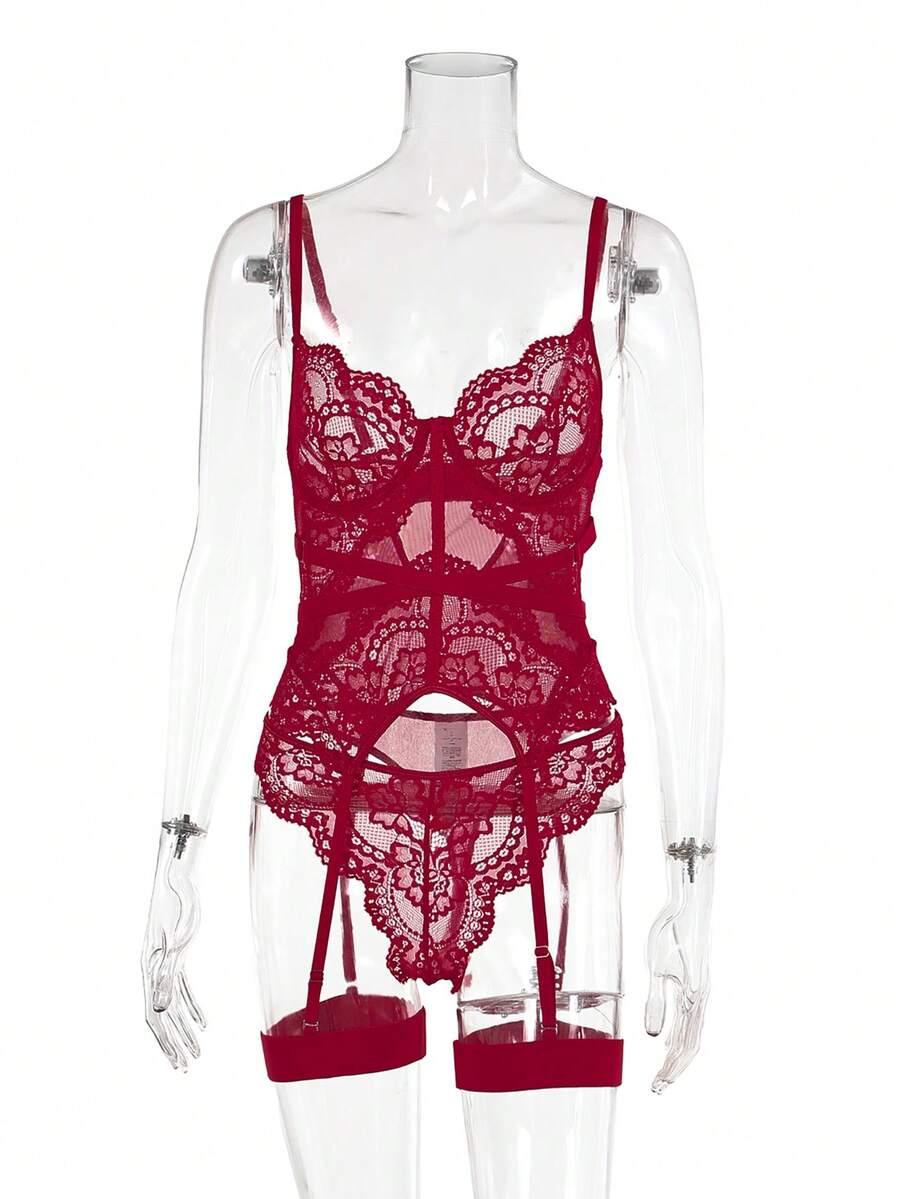 3-piece black lace lingerie set featuring a longline underwire 1/2 cup bra with adjustable spaghetti straps, cut out details, and matching low-rise thong