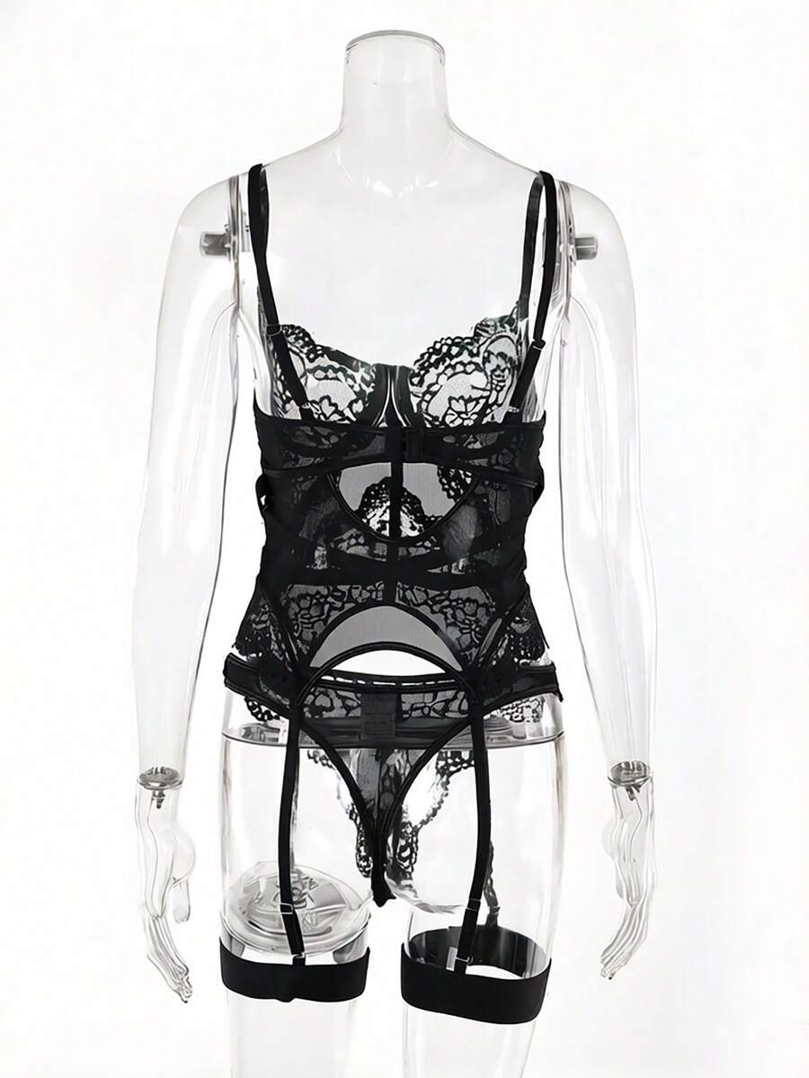 3-piece black lace lingerie set featuring a longline underwire 1/2 cup bra with adjustable spaghetti straps, cut out details, and matching low-rise thong
