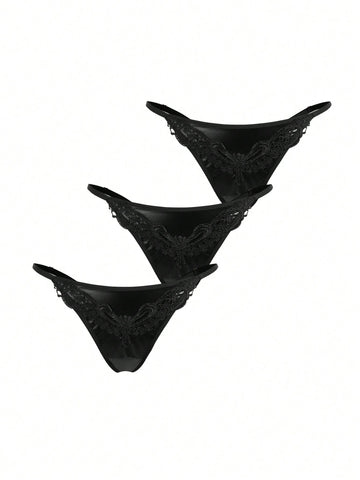 Set of 3 women's black mid-rise goth thongs featuring front embroidered butterfly design and PU leather patchwork details.