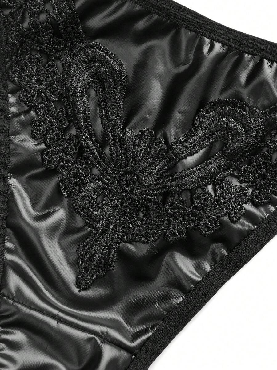 Set of 3 women's black mid-rise goth thongs featuring front embroidered butterfly design and PU leather patchwork details.
