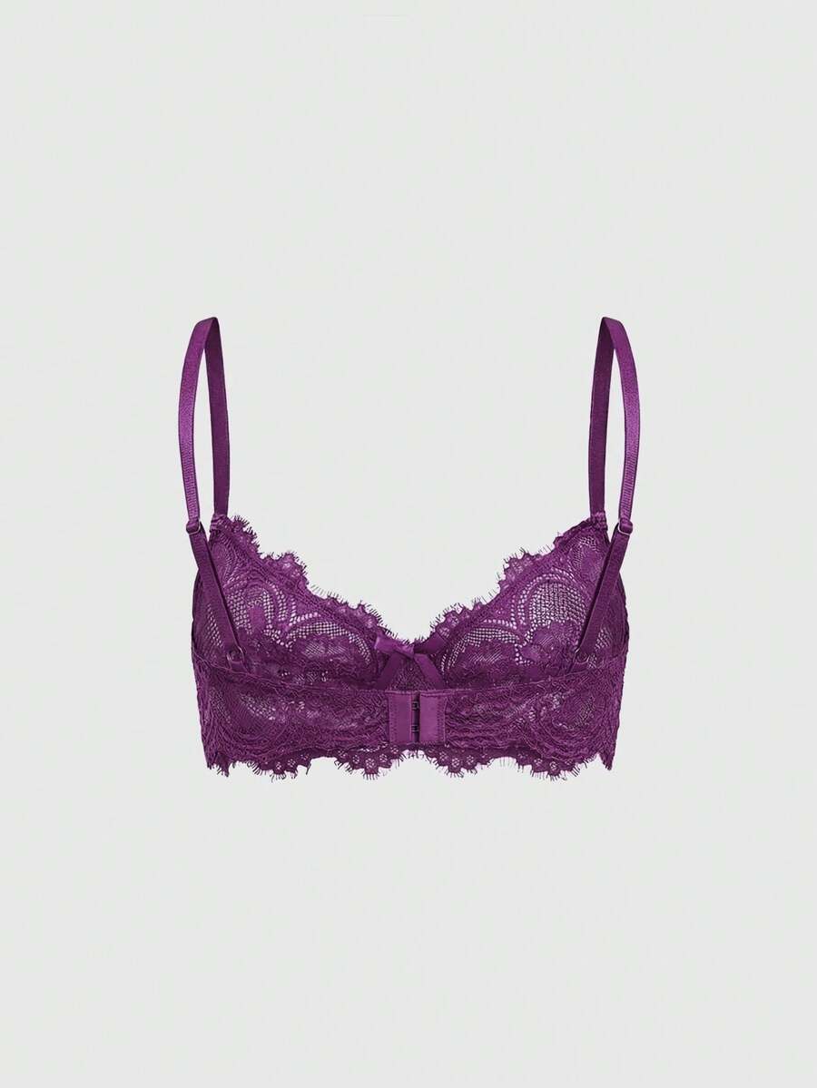 Black sheer floral lace plunge bra featuring underwire support, unlined triangle cups, adjustable straps, and a backless design for women.