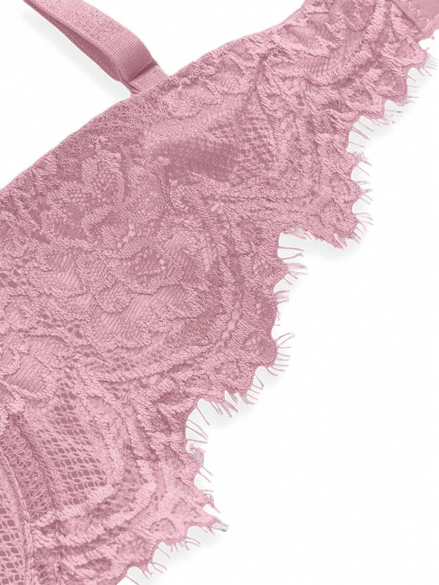 Black sheer floral lace plunge bra featuring underwire support, unlined triangle cups, adjustable straps, and a backless design for women.