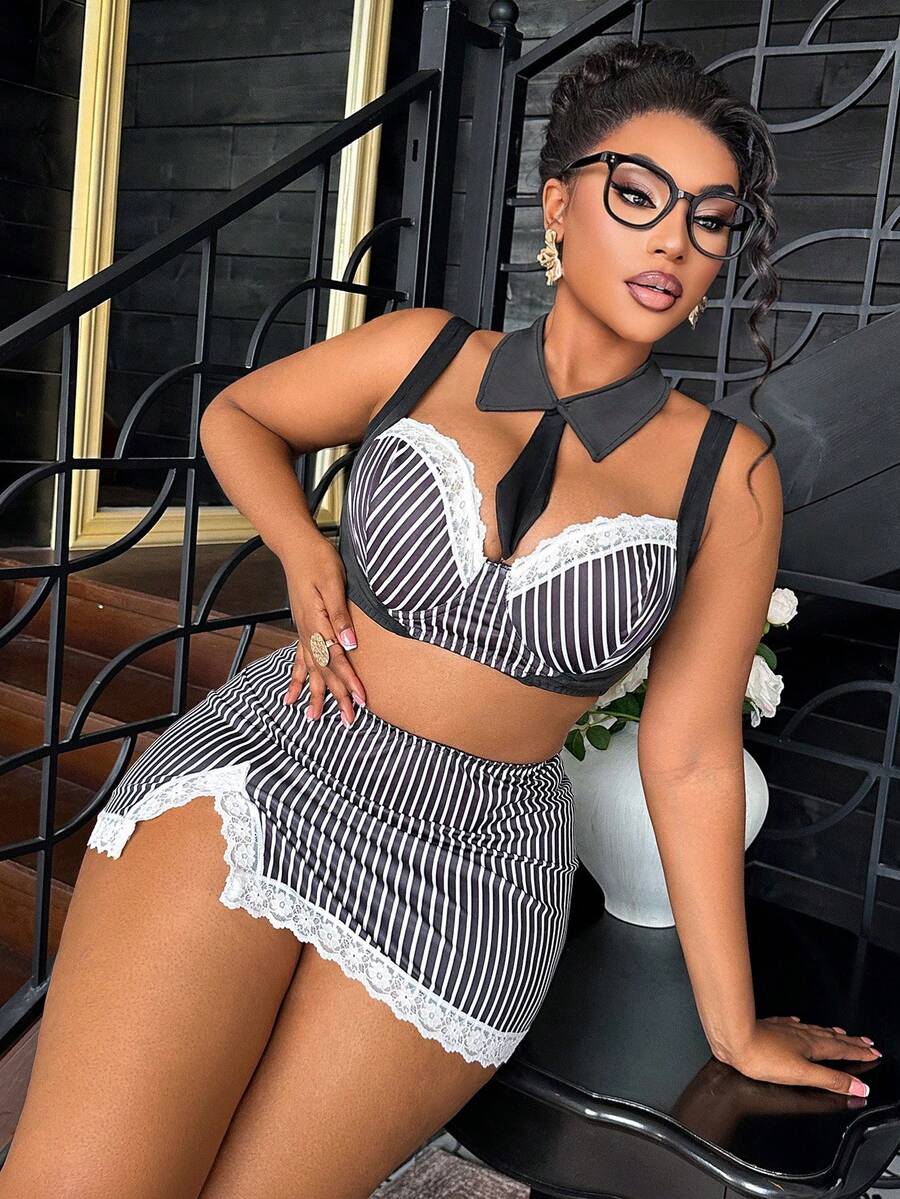 Black and white 3-piece role play lingerie set for women featuring a backless spaghetti strap top with contrast lace, underwire support, and a split short skirt.