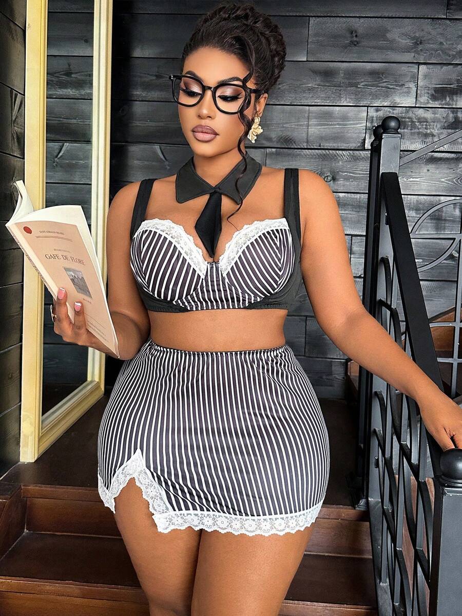 Black and white 3-piece role play lingerie set for women featuring a backless spaghetti strap top with contrast lace, underwire support, and a split short skirt.
