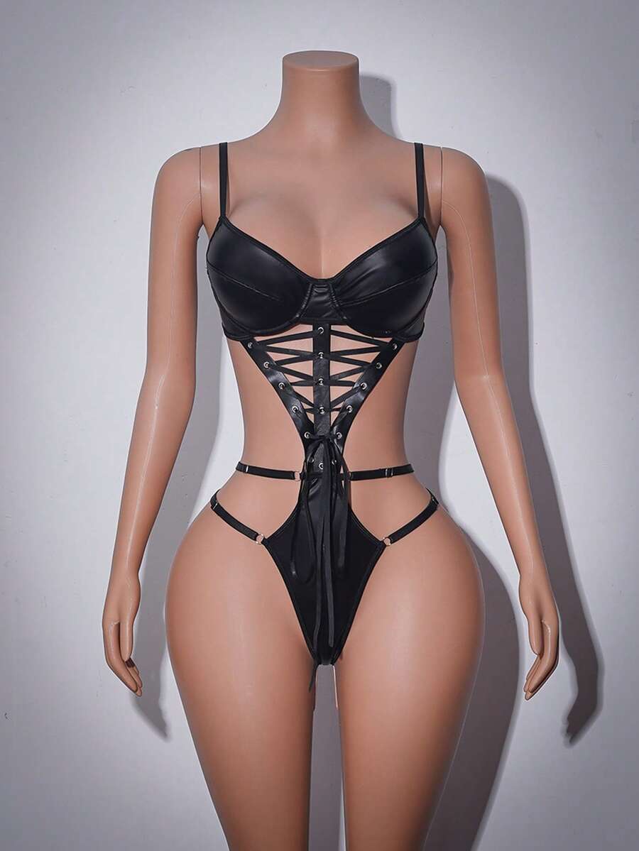 Women's black Y2K teddy lingerie featuring criss cross cut out details, adjustable spaghetti straps, underwire 3/4 cups, and low rise thong bottom.
