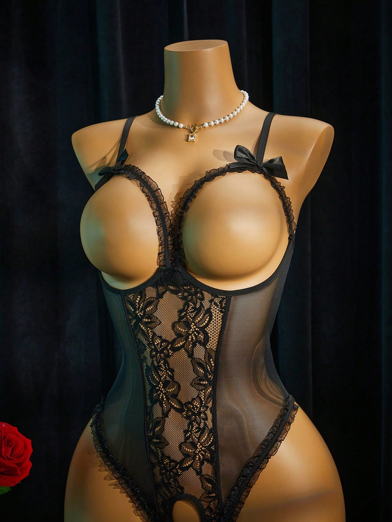 Women's lace mesh lingerie bodysuit with sheer patchwork, backless design, adjustable spaghetti straps, and wireless high-stretch fit.