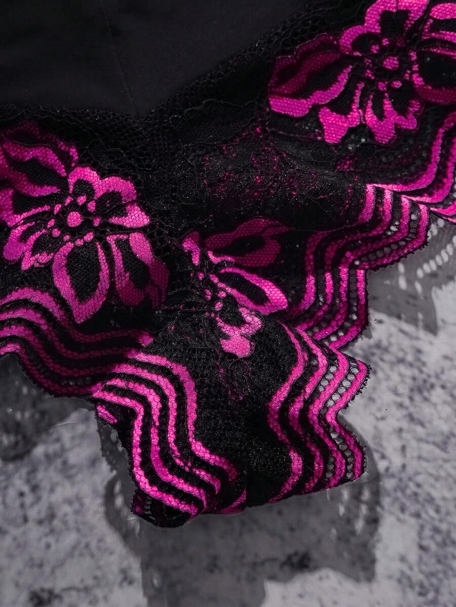 Black and red lace patchwork low rise thong panty for women featuring sheer goth style lace and high stretch fabric.