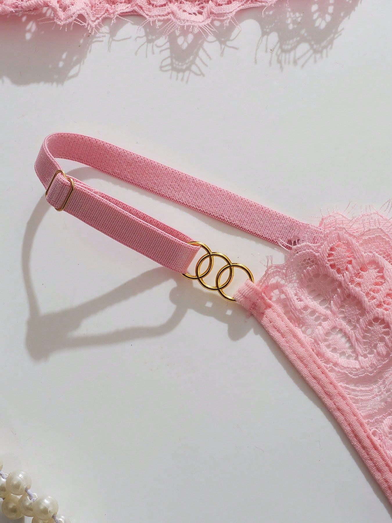 Women's lace bra and panty set with underwire bra, adjustable straps, 3/4 cup design, and matching thong panty in a sheer 2-piece lingerie style.