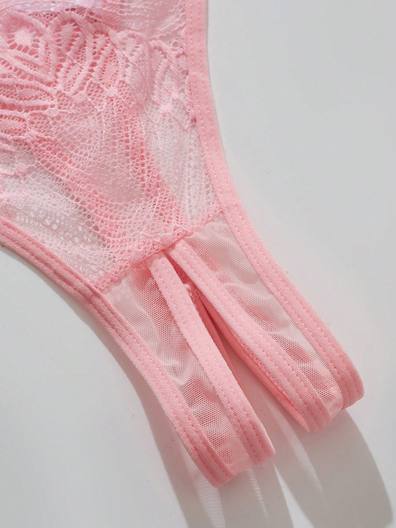 Women's lace bra and panty set with underwire bra, adjustable straps, 3/4 cup design, and matching thong panty in a sheer 2-piece lingerie style.