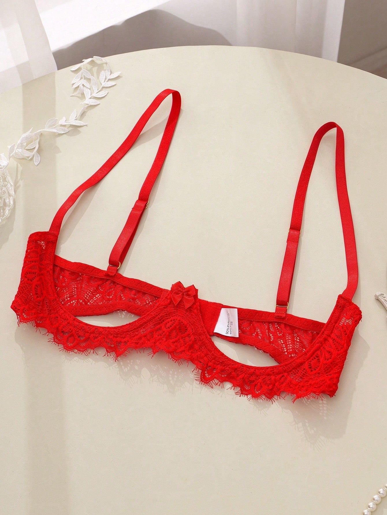 Women's lace bra and panty set with underwire bra, adjustable straps, 3/4 cup design, and matching thong panty in a sheer 2-piece lingerie style.
